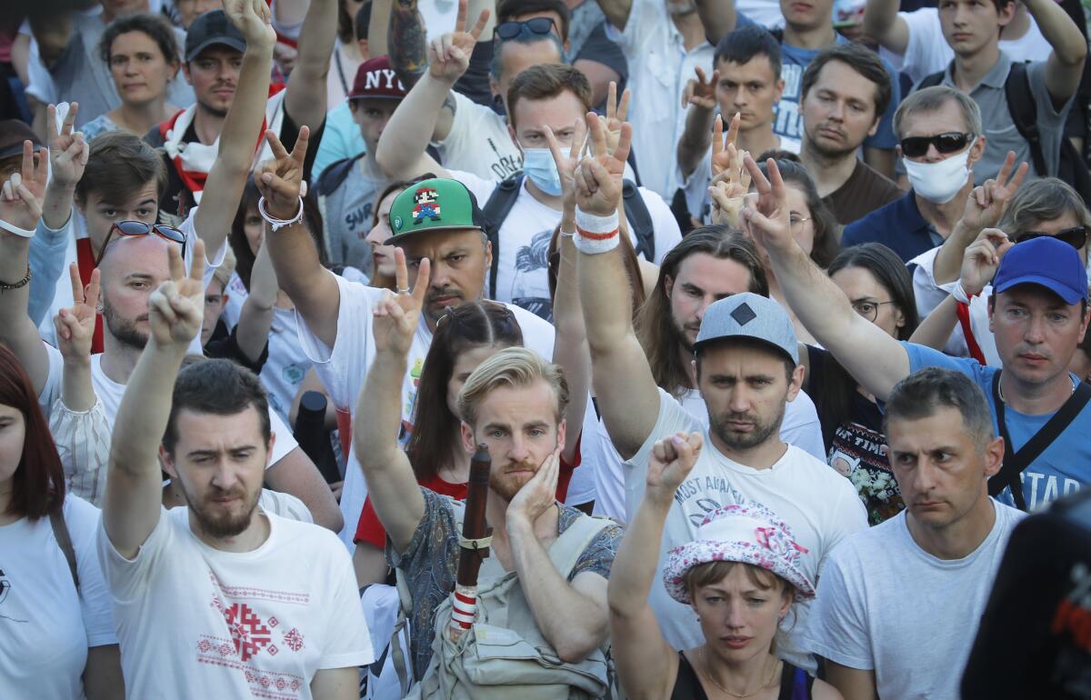 Belarusian opposition supporters gather for a protest in Minsk, Belarus, on Monday.