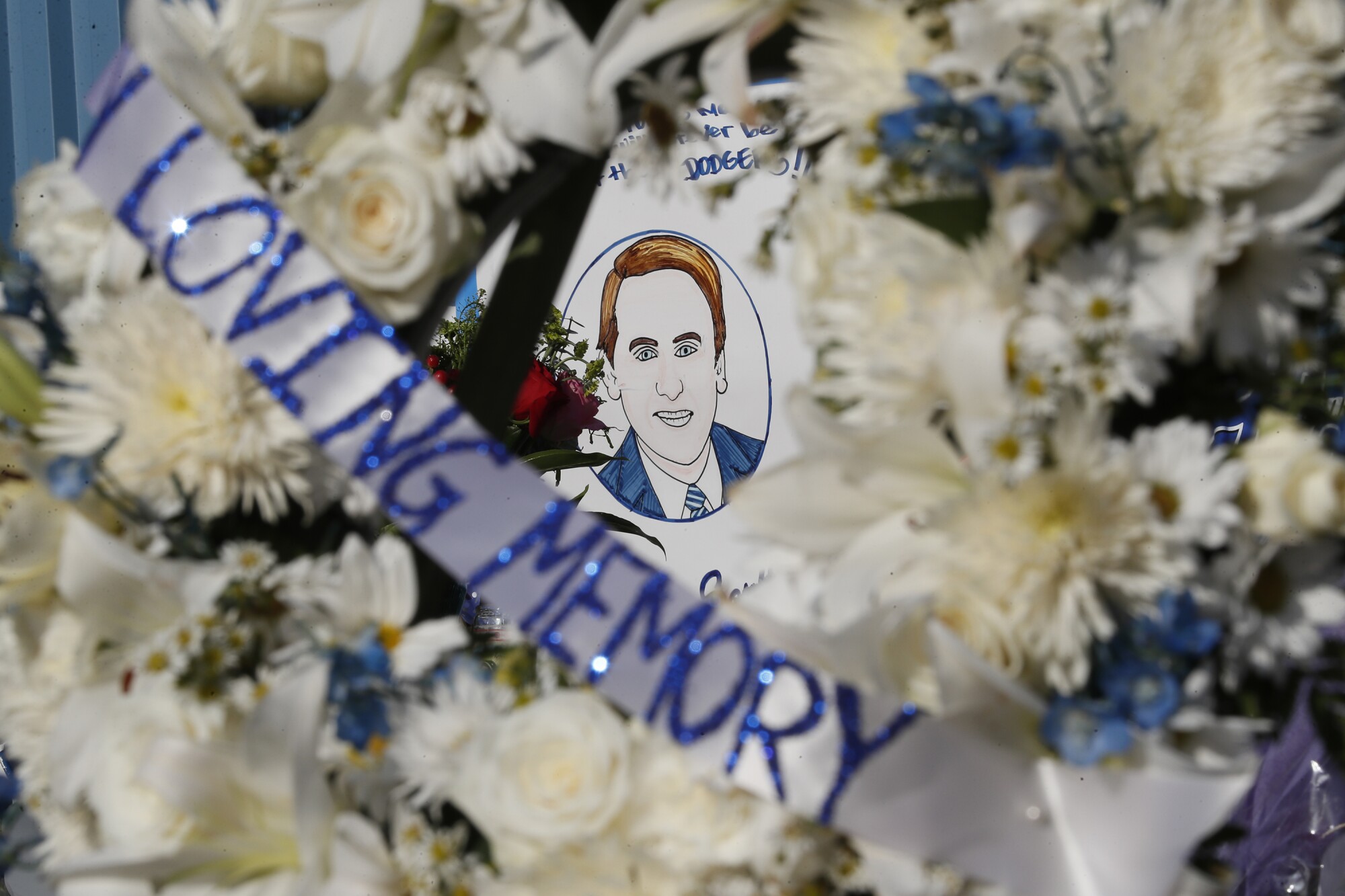 The memorial includes handmade tributes.