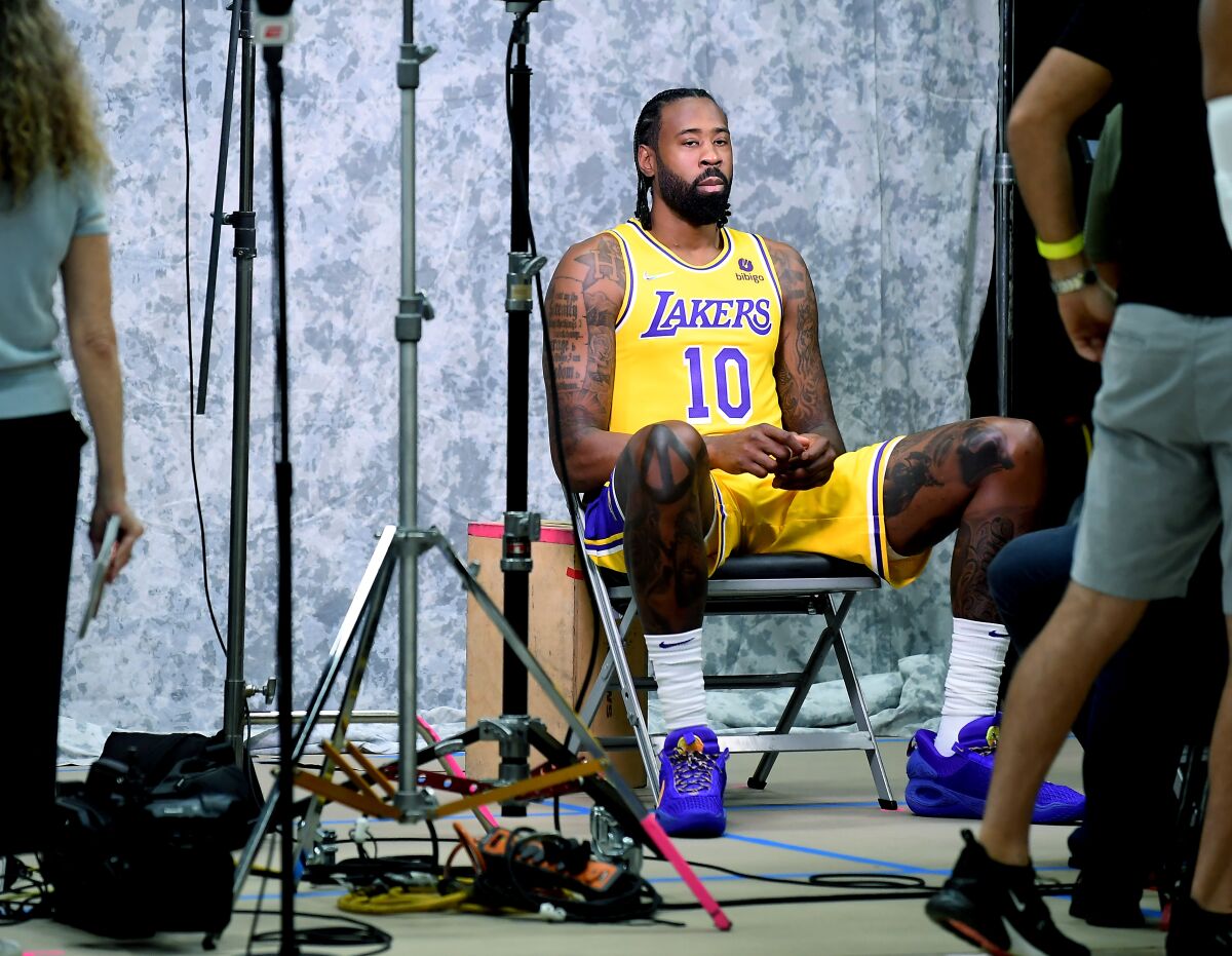 New Lakers center DeAndre Jordan poses for pictures during media day.