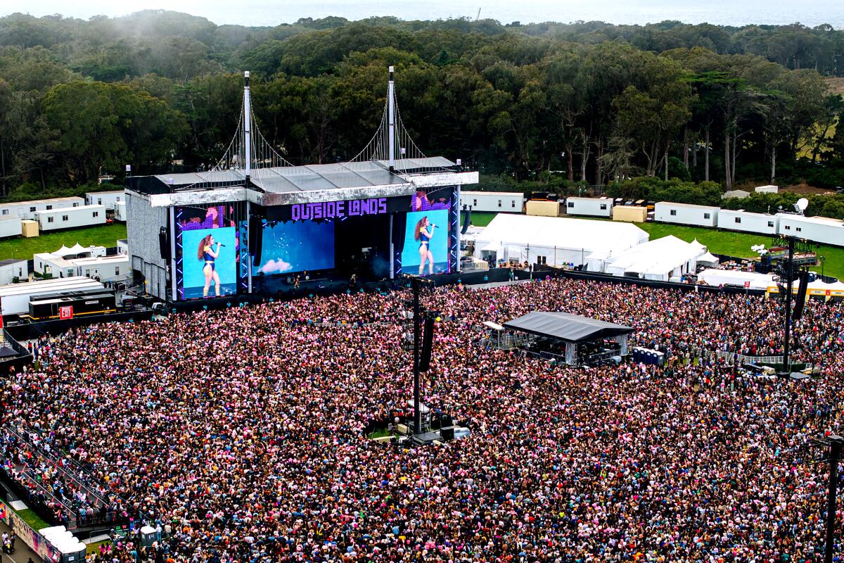  The crowd during Chappell Roan's set at a music festival.