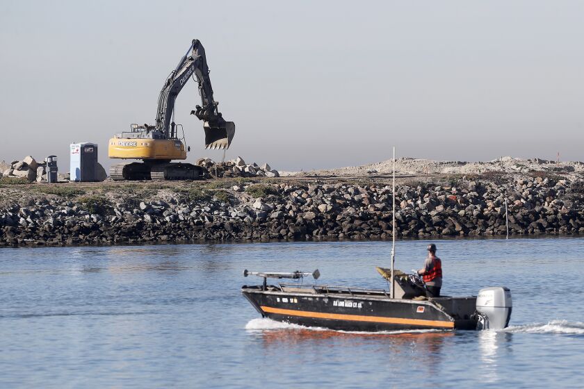 Naval Weapons Station Seal Beach begins dredging Anaheim Bay in Seal Beach. The construction is part of the $154 million pier replacement that's been planned for at least 20 years.