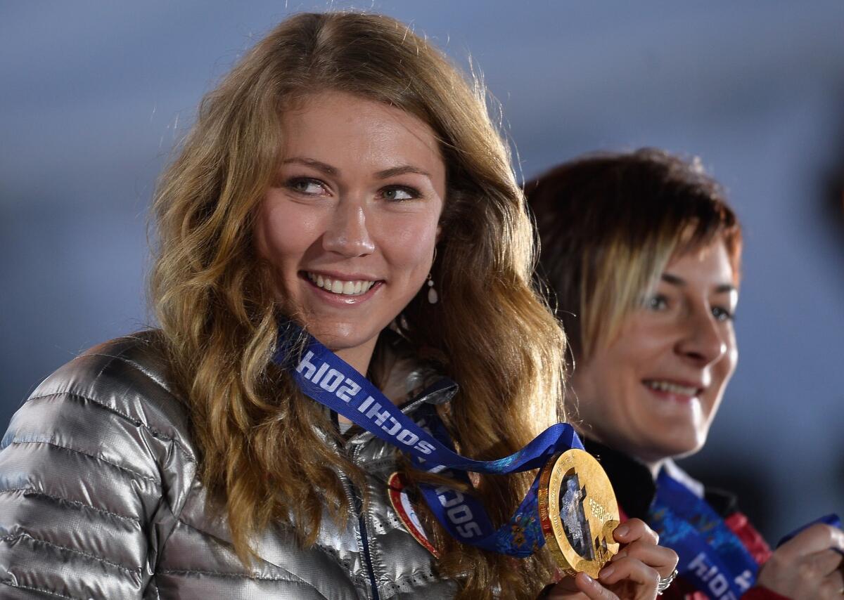 Gold medalist Mikaela Shiffrin of the United States celebrates during the medal ceremony for the women's slalom at the Sochi 2014 Winter Olympics on Feb. 22, 2014 in Sochi, Russia.