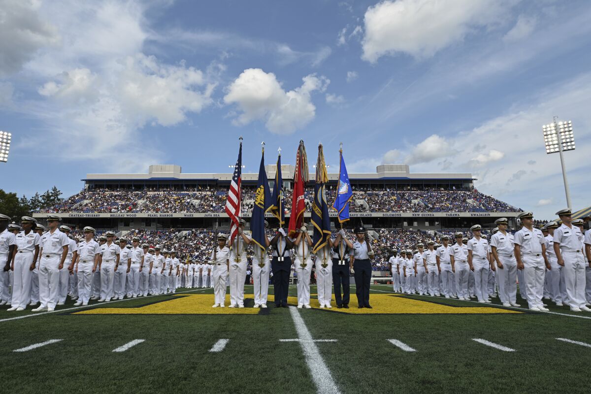 The Brigade of Midshipmen stand at attention before the national anthem ahead of the game between Navy and Air Force.