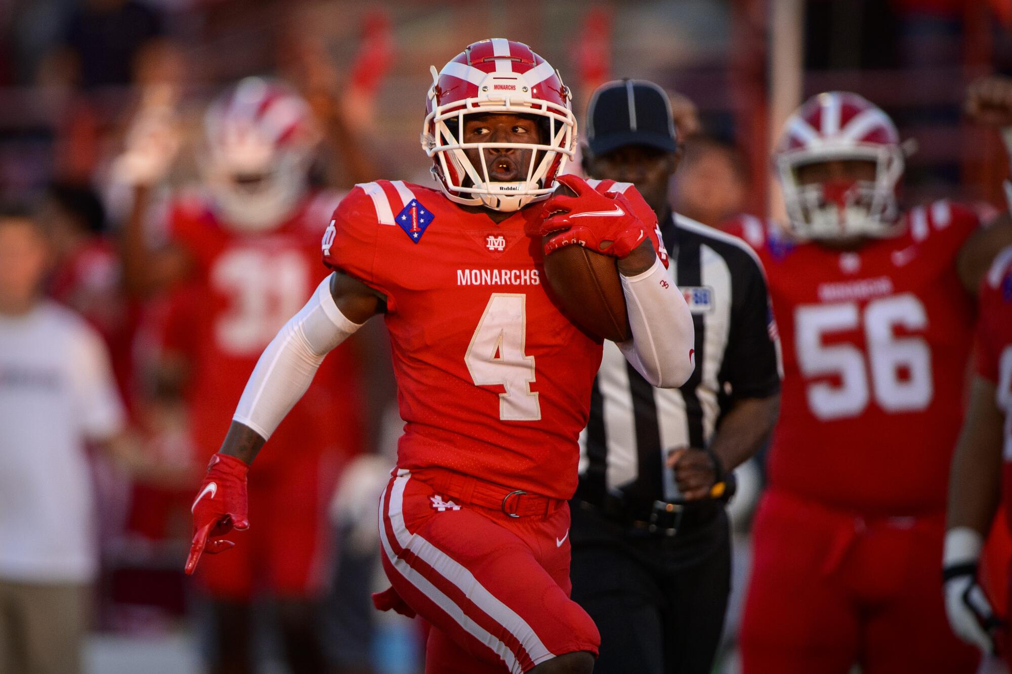 Raleek Brown scores a touchdown for Mater Dei during a game against Duncanville in Texas in August 2021.