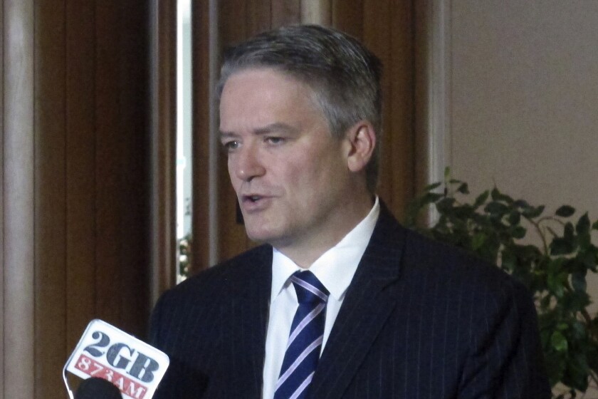 FILE - In this Aug. 8, 2017, file photo, Australian Finance Minister Mathias Cormann addresses reporters at Parliament House in Canberra, Australia. The Organisation for Economic Co-operation and Development, the OECD, said Monday it has appointed Australian former Finance Minister Mathias Cormann as its head - despite objections over his climate record. (AP Photo/Rod McGuirk, File)