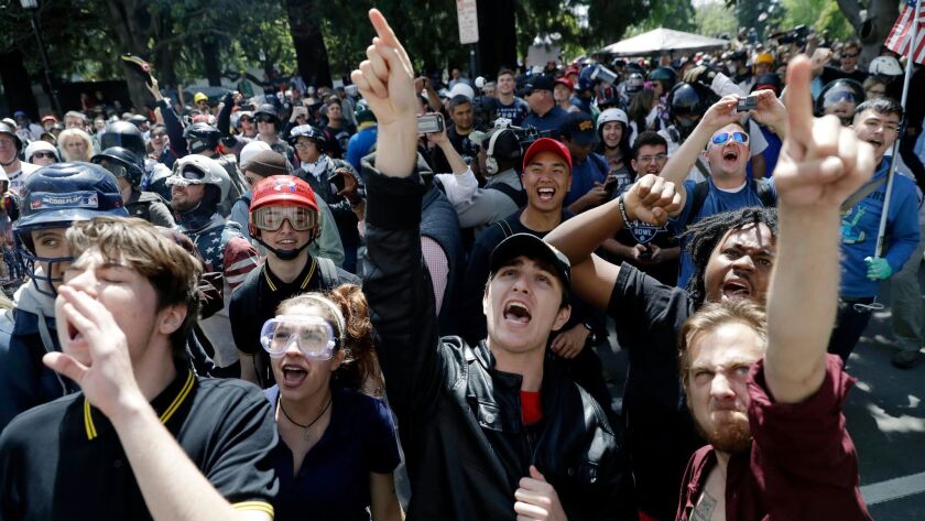 Demonstrators rally for free speech last month near the UC Berkeley campus, where Ann Coulter's speech was canceled amid threats of violence.