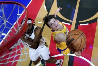 Los Angeles Lakers guard Austin Reaves (15) drives against Indiana Pacers forward Isaiah Jackson (22) during the first half of the championship game in the NBA basketball In-Season Tournament, Saturday, Dec. 9, 2023, in Las Vegas. (Kyle Terada/Pool Photo via AP)