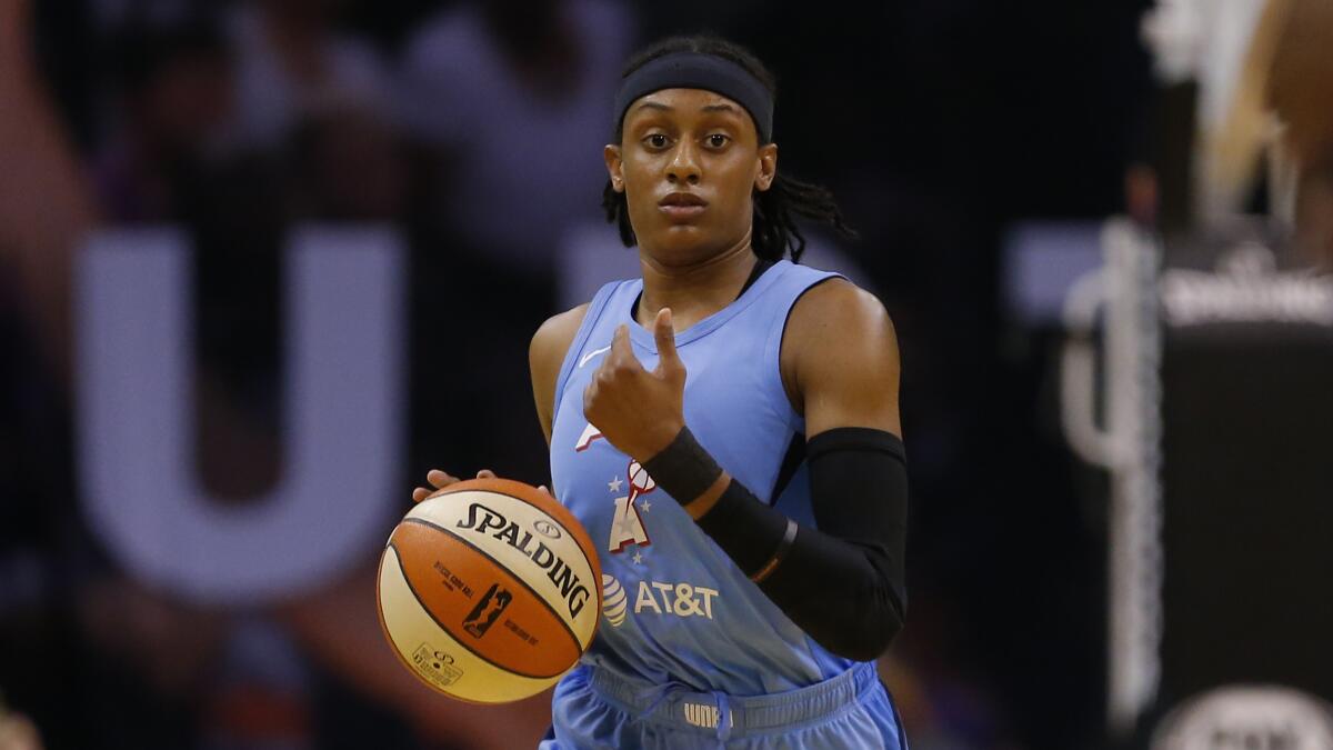 Atlanta Dream guard Brittney Sykes controls the ball during a game against the Phoenix Mercury on Aug. 16.