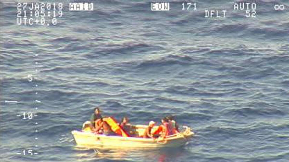 An image from New Zealand Defense Force video shows the wooden dinghy adrift in the Pacific.