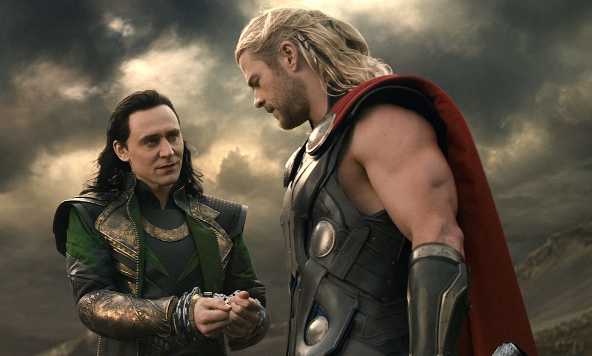 Tom Hiddelston as Loki and Chris Hemsworth as Thor
