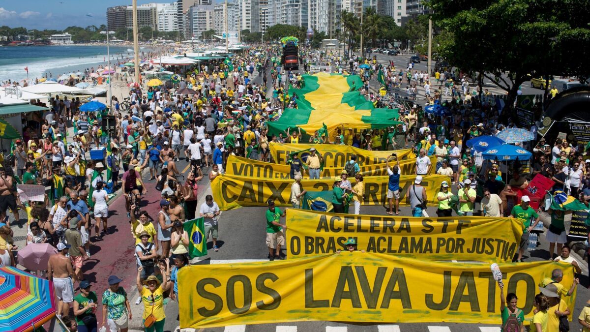 Marchers at Copacabana Beach in Rio de Janeiro show their support in March for the "Lava Jato," or Car Wash, anti-corruption investigation that has roiled Brazilian politics.