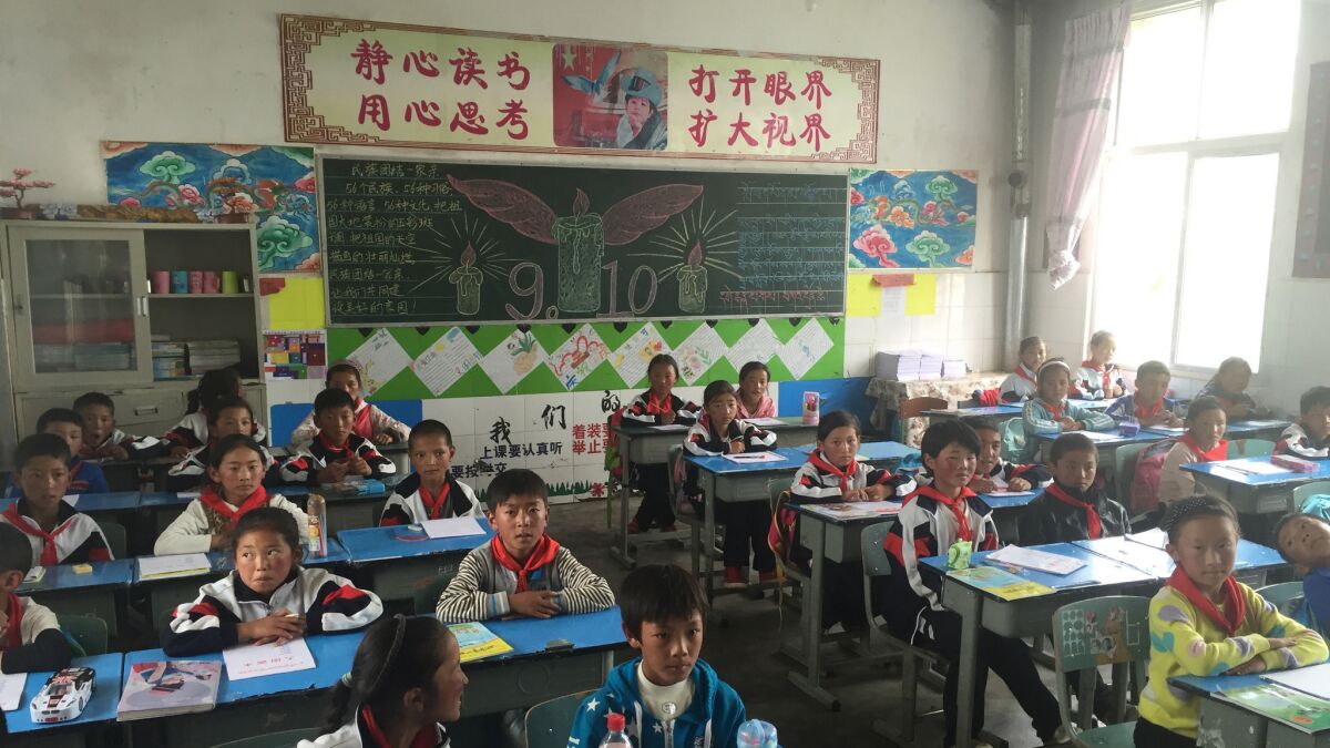 Students at the Qiongxi town primary school, a boarding school for the children of Tibetan herders. Most classes are taught in Tibetan. (Jonathan Kaiman / Los Angeles Times)