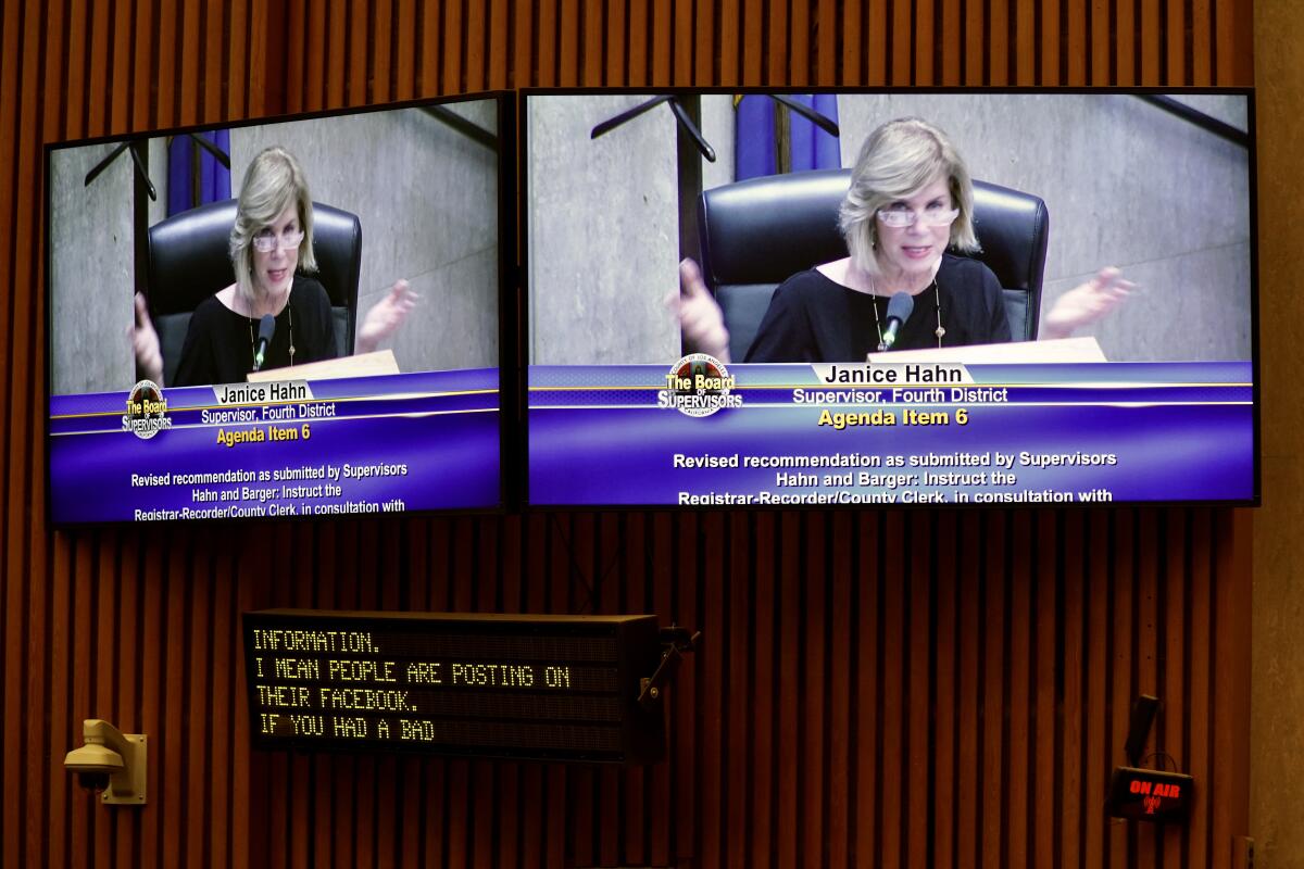 A monitor displays Los Angeles County Supervisor Janice Hahn during a meeting of the Board of Supervisors in 2020.