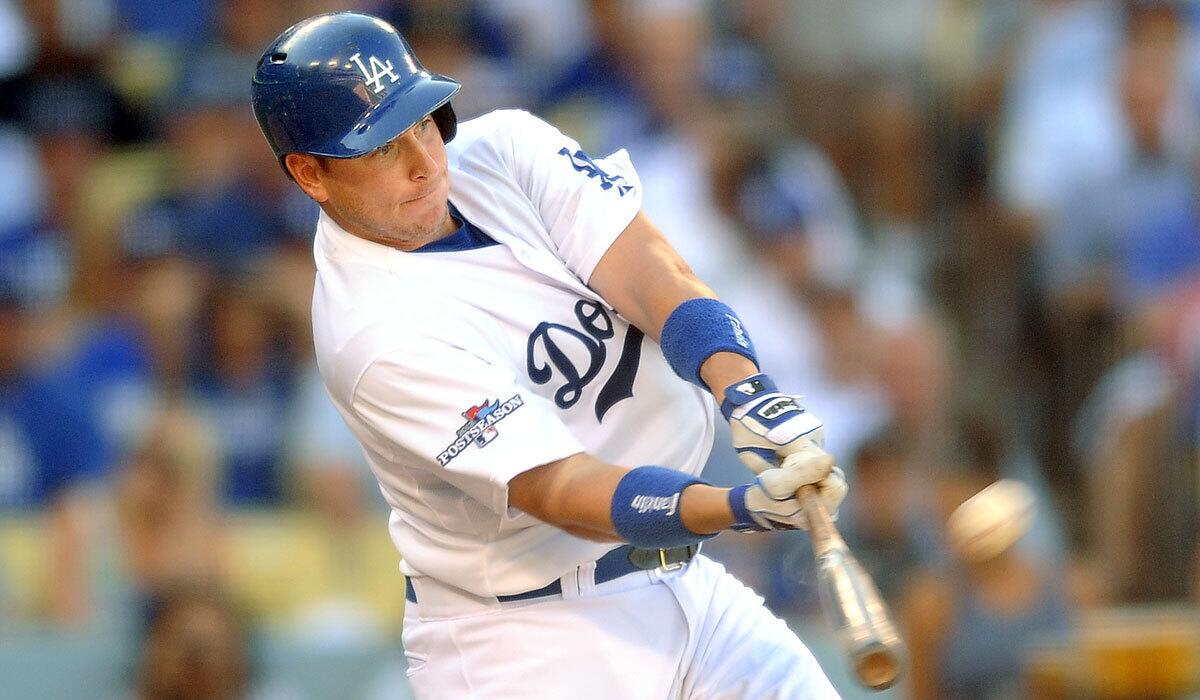 Dodgers' A.J. Ellis hits a solo home run against St. Louis during Game 5 of the 2013 National League Championship Series.