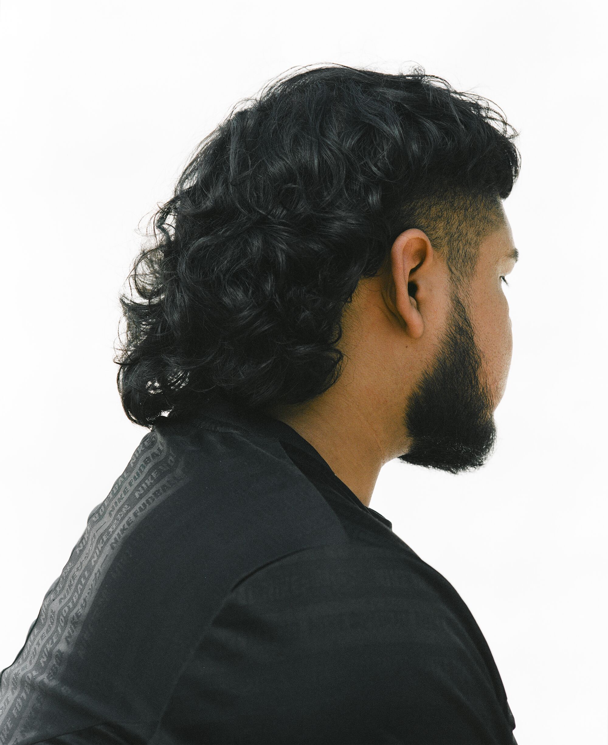 Photo of a mullet seen from behind