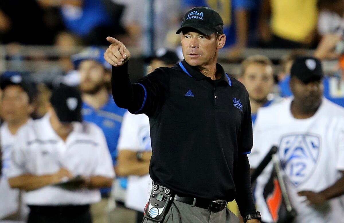 UCLA Coach Jim Mora directs his team against BYU at the Rose Bowl on Sept. 19.