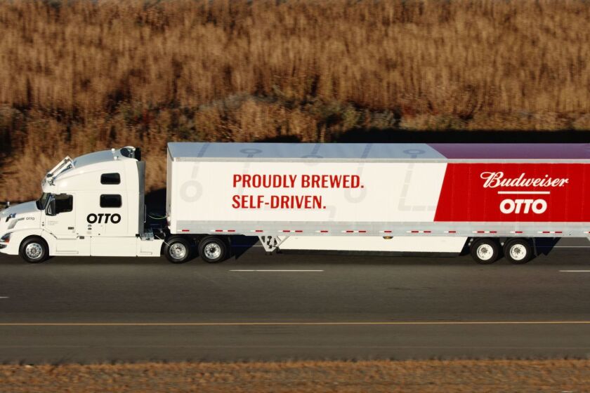 This October 20, 2016 photo courtesy of Aether Films shows a self-driving truck built by Uber's unit Otto on the road in Colorado. A self-driving truck built by Uber's unit Otto made a pioneering delivery of beer in Colorado last week, Otto announced October 25, 2016. The 18-wheel semi loaded down with Budweiser made the 120 mile (200 kilometer) trip from Fort Collins through the center of crowded Denver to Colorado Springs using only its panoply of cameras, radar and sensors to read the road. The truck carried a professional driver, but he simply monitored the progress from the truck's sleeper berth behind the driver's seat. The trip was a fairly straight two-hour drive south on the I-25 highway, "exit-to-exit", the company said in a statement, suggesting the initial and final stretches off the highway were handled by a driver. The test came just six weeks after Uber launched its demonstration self-driving car service in Pittsburgh, Pennsylvania, gaining a jump on the many automakers that are now developing systems for cars and trucks to pilot themselves. / AFP PHOTO / Aether Films / HO / RESTRICTED TO EDITORIAL USE - MANDATORY CREDIT "AFP PHOTO /AETHER FILMS" - NO MARKETING NO ADVERTISING CAMPAIGNS - DISTRIBUTED AS A SERVICE TO CLIENTS == NO ARCHIVE HO/AFP/Getty Images ** OUTS - ELSENT, FPG, CM - OUTS * NM, PH, VA if sourced by CT, LA or MoD **