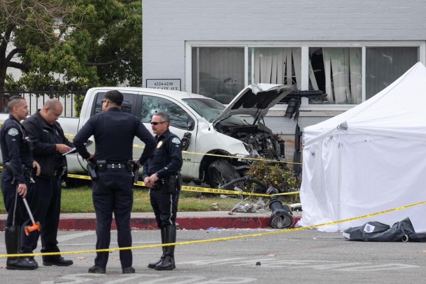 LOS ANGELES, CA - APRIL 25: A woman was killed and a girl about six years old was injured in a traffic crash at Colgate Avenue and Ogden Drive in the Mid-Wilshire area of Los Angeles on Tuesday, April 25, 2023 in Los Angeles, CA. (Myung J. Chun / Los Angeles Times)