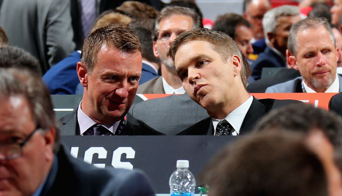 Kings general manager Rob Blake and team president Luc Robitaille attend the 2107 NHL Draft in Chicago.