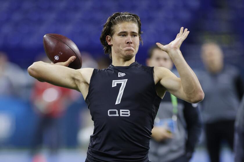 INDIANAPOLIS, IN - FEBRUARY 27: Quarterback Justin Herbert of Oregon throws a pass during the NFL Scouting Combine at Lucas Oil Stadium on February 27, 2020 in Indianapolis, Indiana. (Photo by Joe Robbins/Getty Images)
