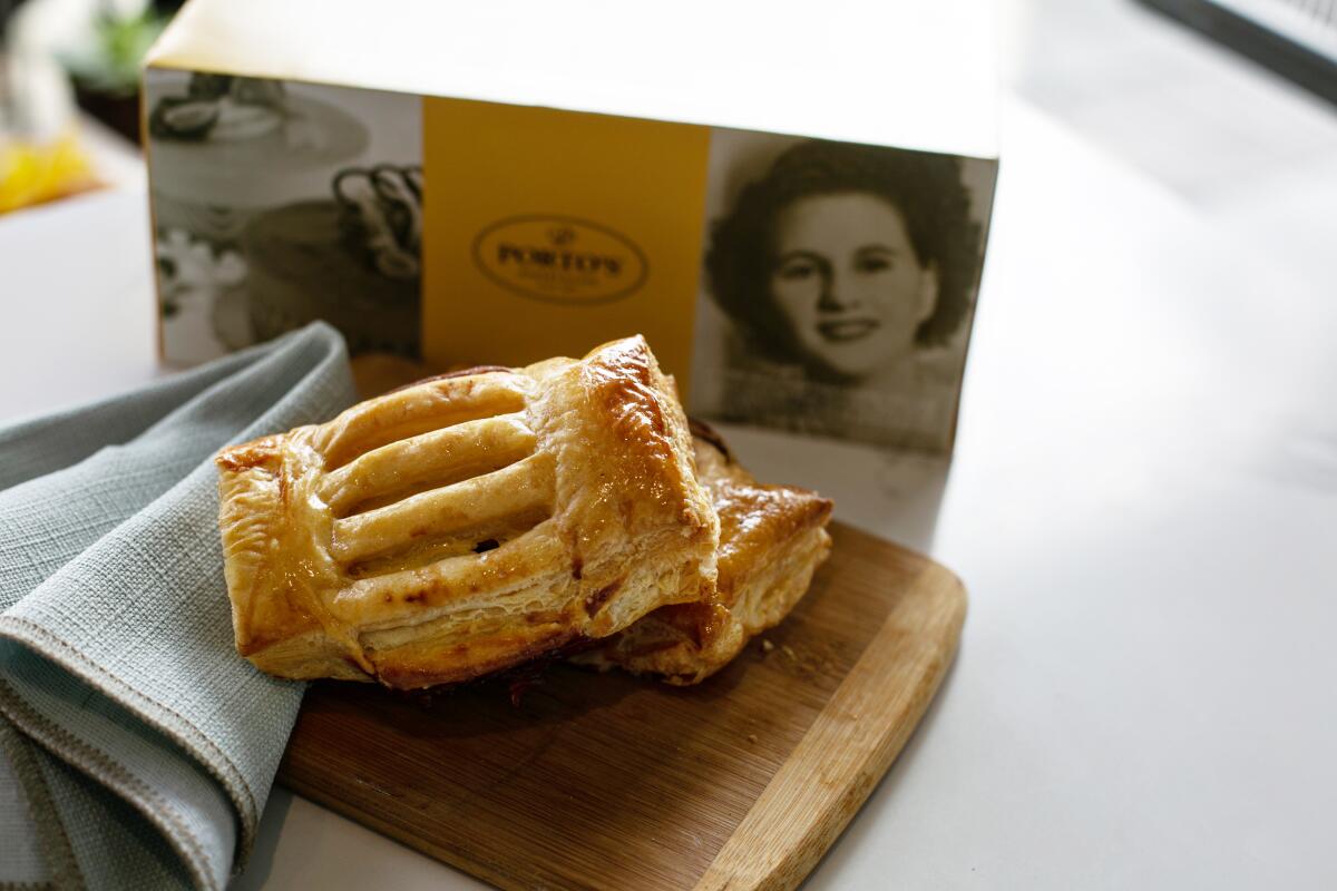 Shoppers peruse the pastry case at Porto's Bakery & Cafe in Glendale.