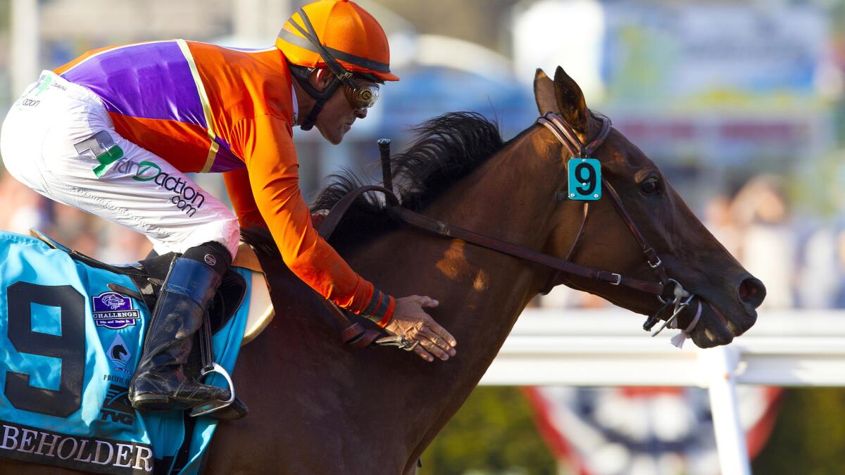 Beholder races to a win in the Pacific Classic at Del Mar in 2015.