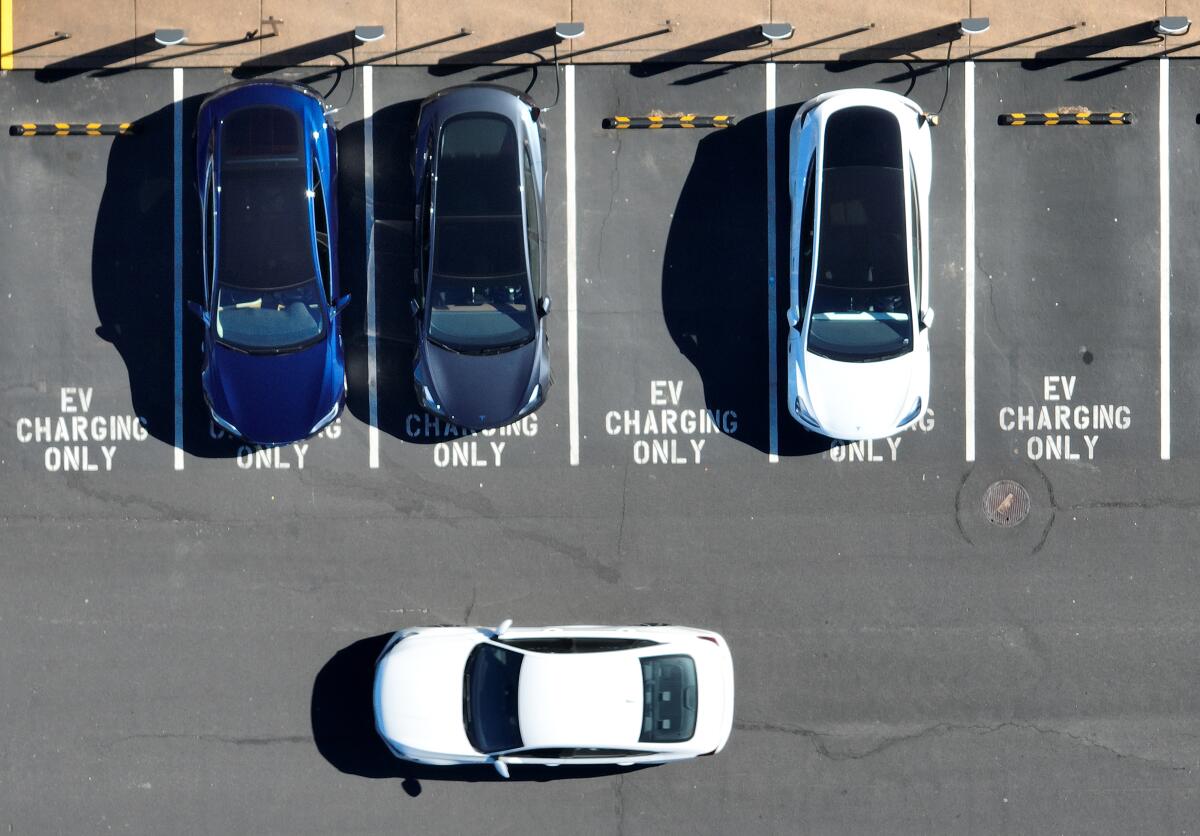 Tesla cars recharge in Corte Madera, Calif., in 2023.