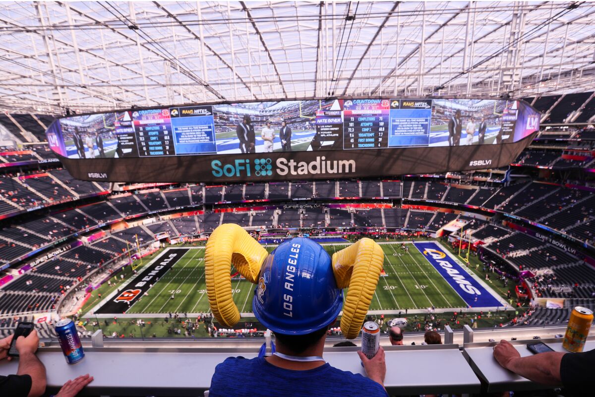 A Rams fan looks over the field before the start of Super Bowl LVI at SoFi Stadium on Sunday.