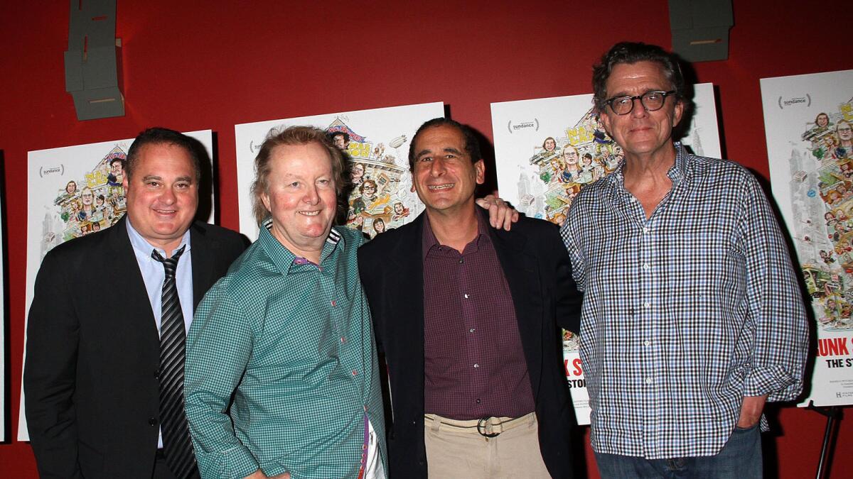 From left, Douglas Tirola, Tony Hendra, Mike Reiss and Kurt Anderson attend the "Drunk Stone Brilliant Dead" New York premiere.