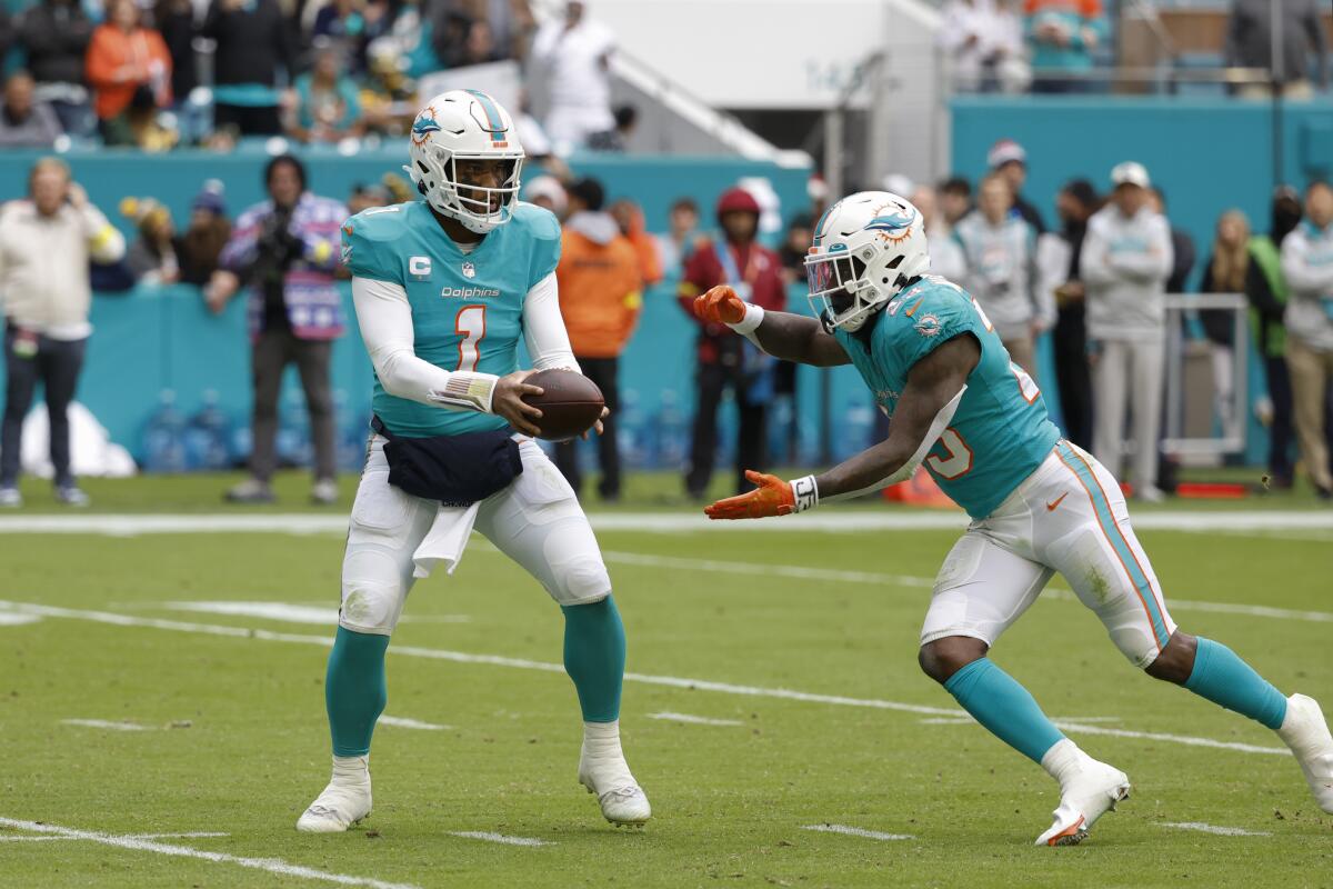 Miami Dolphins quarterback Teddy Bridgewater (5) drops back to