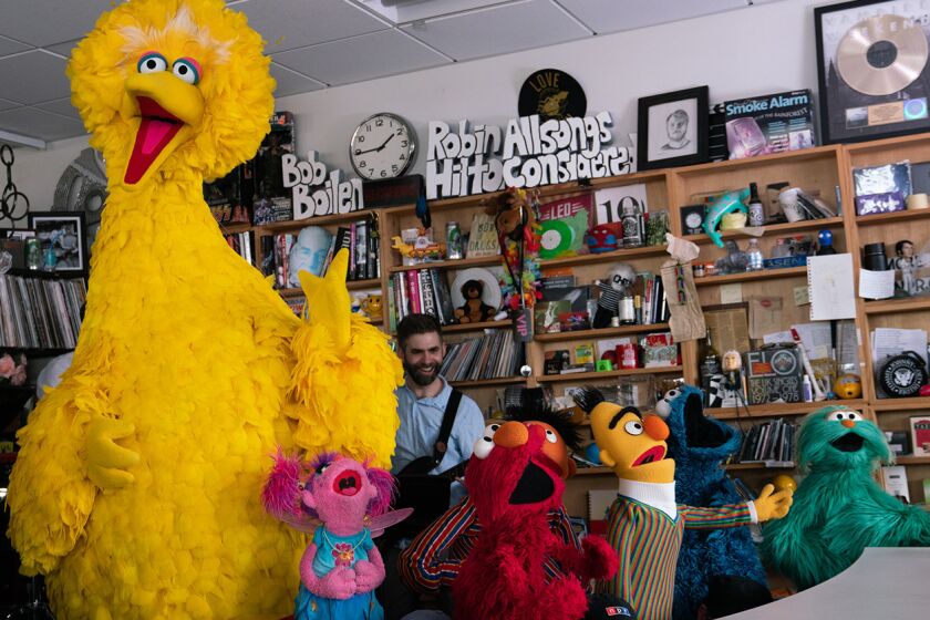 Sesame Street plays a Tiny Desk concert on May 10, 2019 (Claire Harbage/NPR).