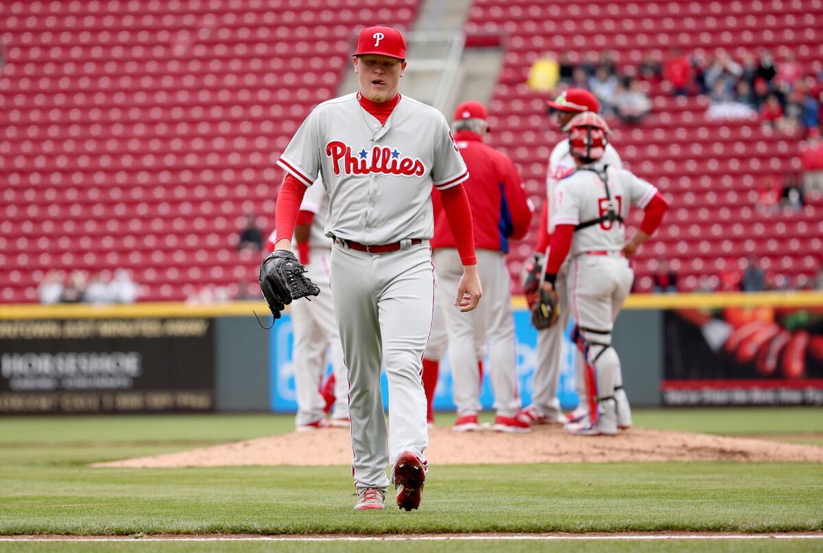 Phillies pitcher Daniel Stumpf (53) walks off of the field after being replaced in the fourth inning of a game against the Reds.