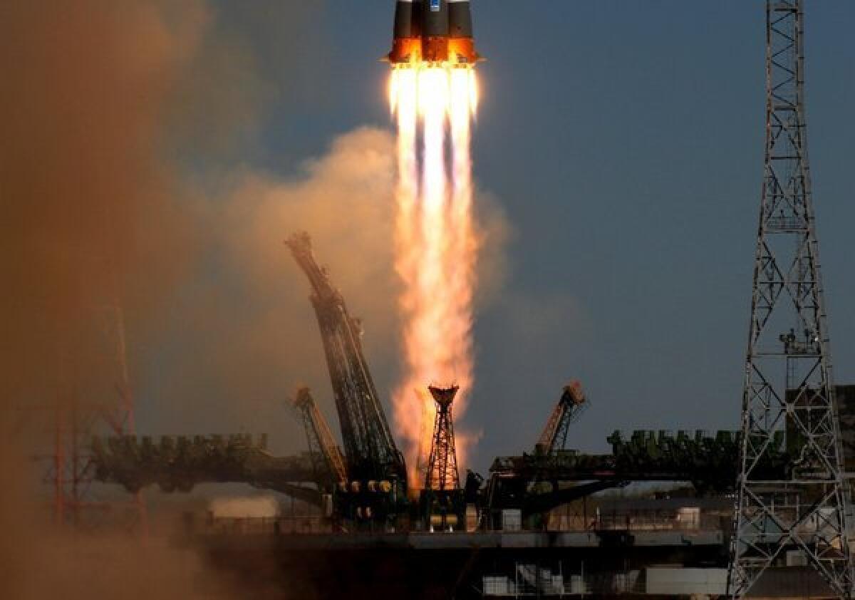 A Soyuz rocket blasts off April 19 carrying a Russian experiment: mice, gerbils, lizards and other creatures. Many of the rodents died.