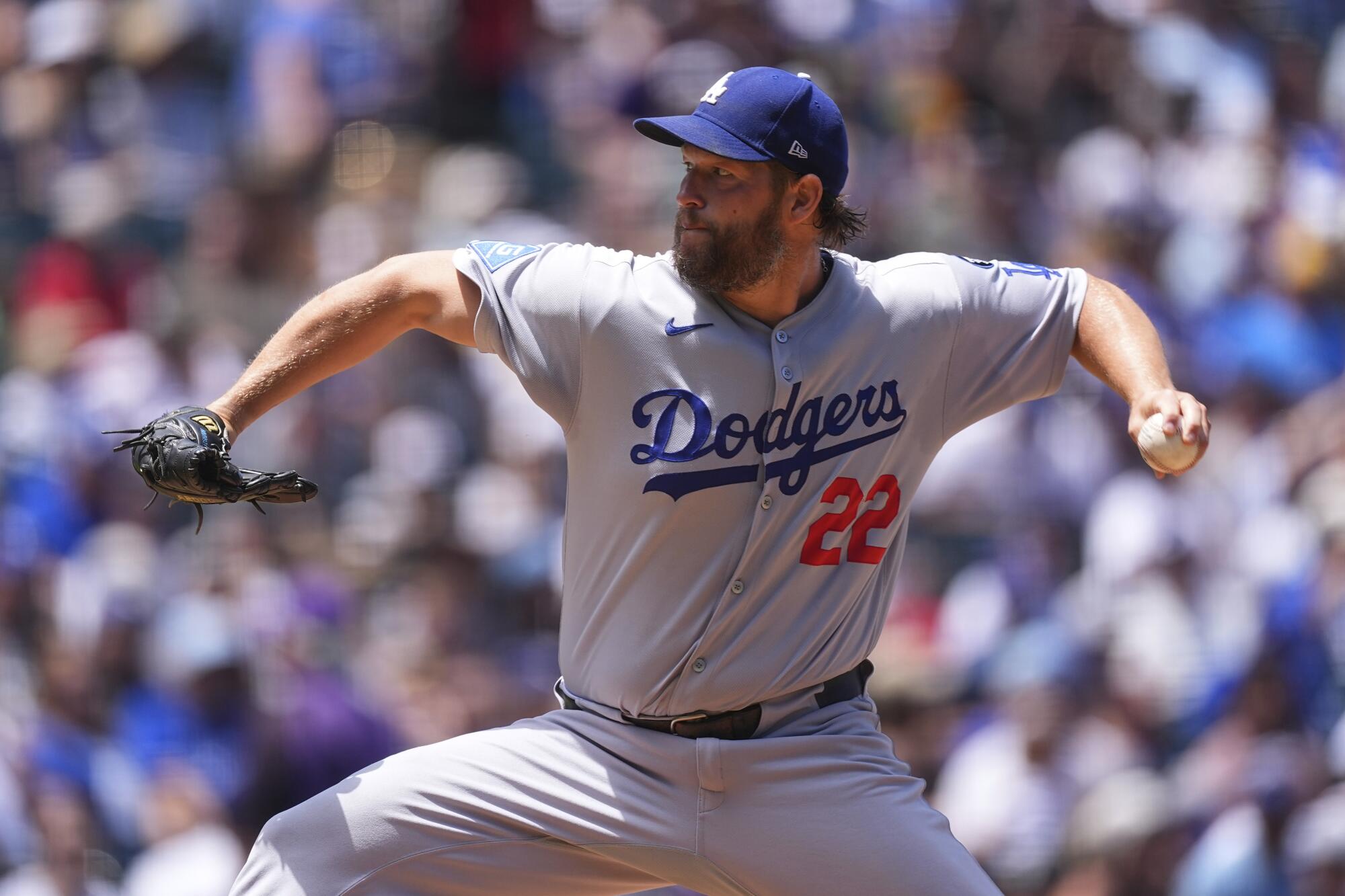 Dodgers pitcher Clayton Kershaw works against the Colorado Rockies in the first inning Thursday.
