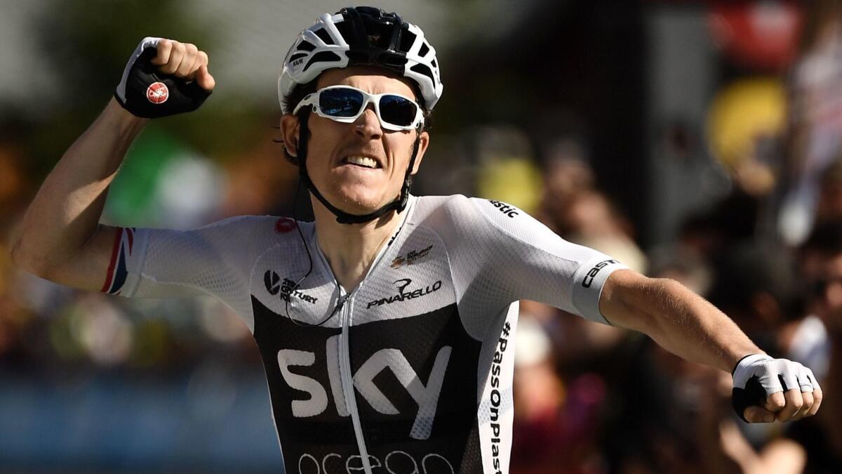 Geraint Thomas celebrates as he crosses the finish line to win Stage 11 of the Tour de France on July 18.