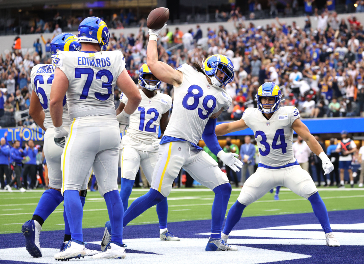 Rams tight end Tyler Higbee spikes the ball after scoring a touchdown in the second quarter Sunday.