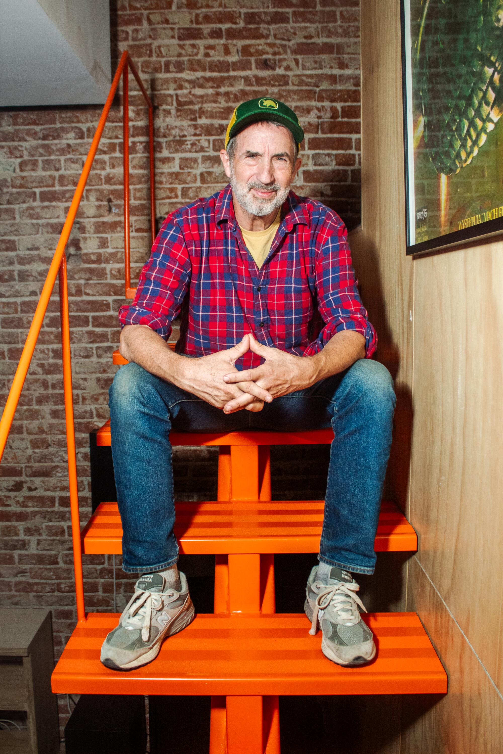 Good poses on a bright orange staircase.