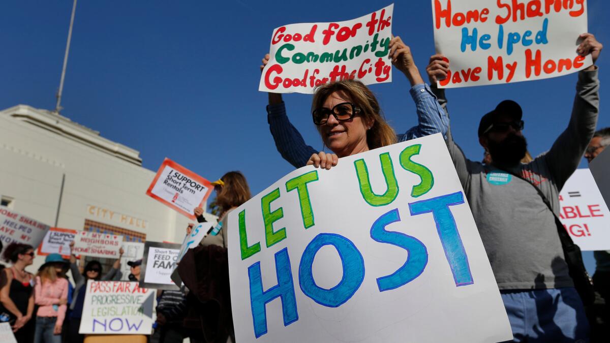 Airbnb supporters rally outside Santa Monica City Hall in May 2015.