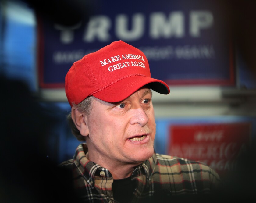 Former major league pitcher Curt Schilling campaigns for Donald Trump in 2016 in Salem, N.H.