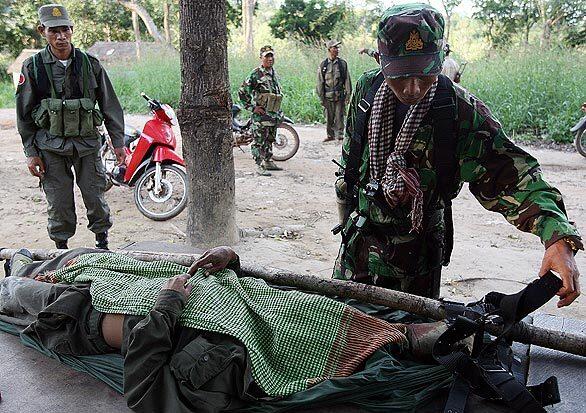 A border dispute between Cambodia and Thailand erupted into a gunbattle that killed two Cambodian soldiers near Preah Vihear temple. The fighting ended after about an hour. Each side accused the other of firing the first shot; officials from both sides downplayed the violence and called for a peaceful resolution.