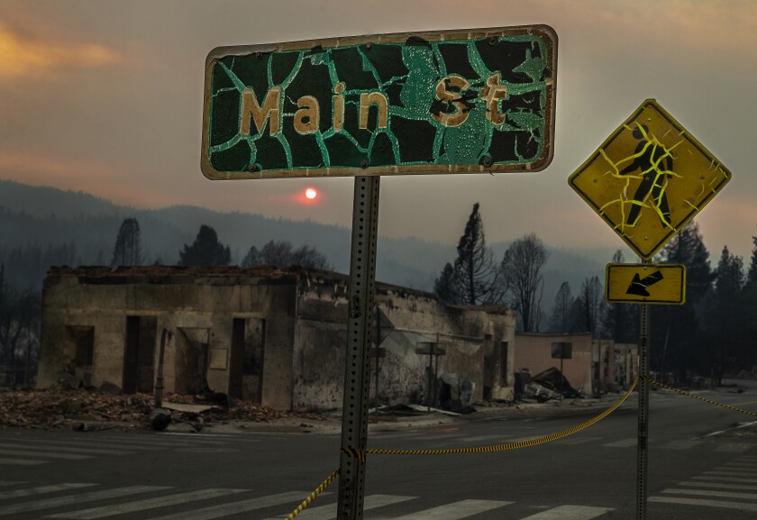 A number of signs, like these  in the town of Greenville, melted due to the temperature created by the Dixie Fire. 