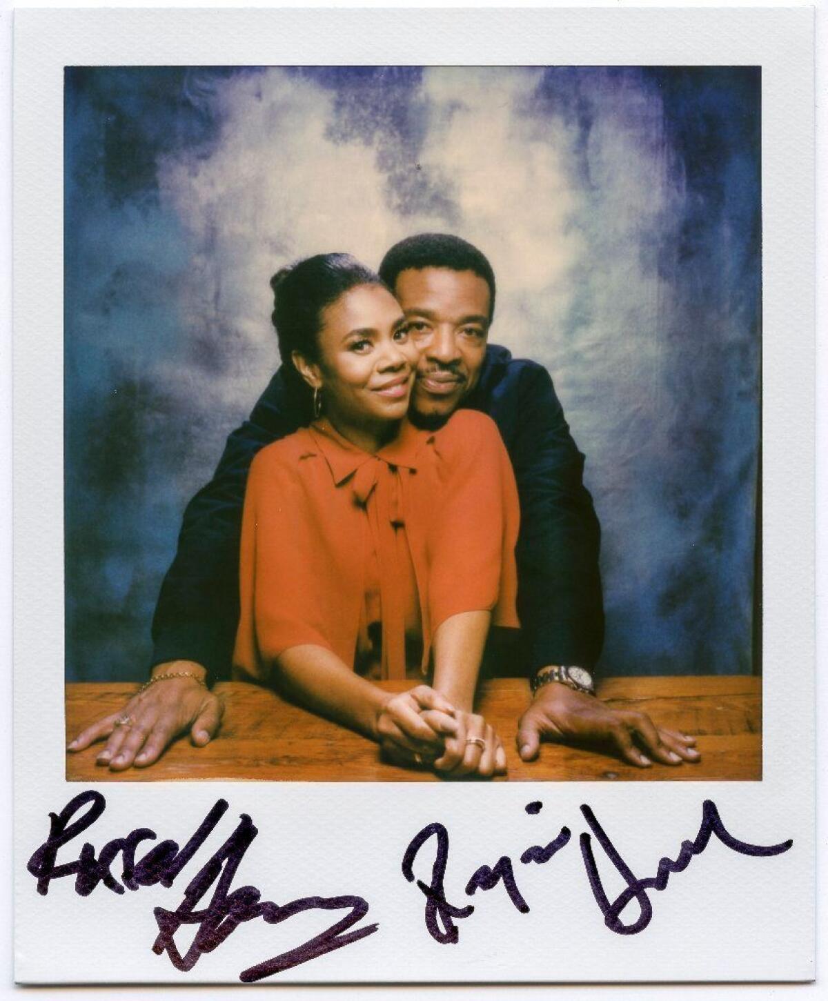 A Polaroid of "The Hate U Give" costars Regina Hall and Russell Hornsby.