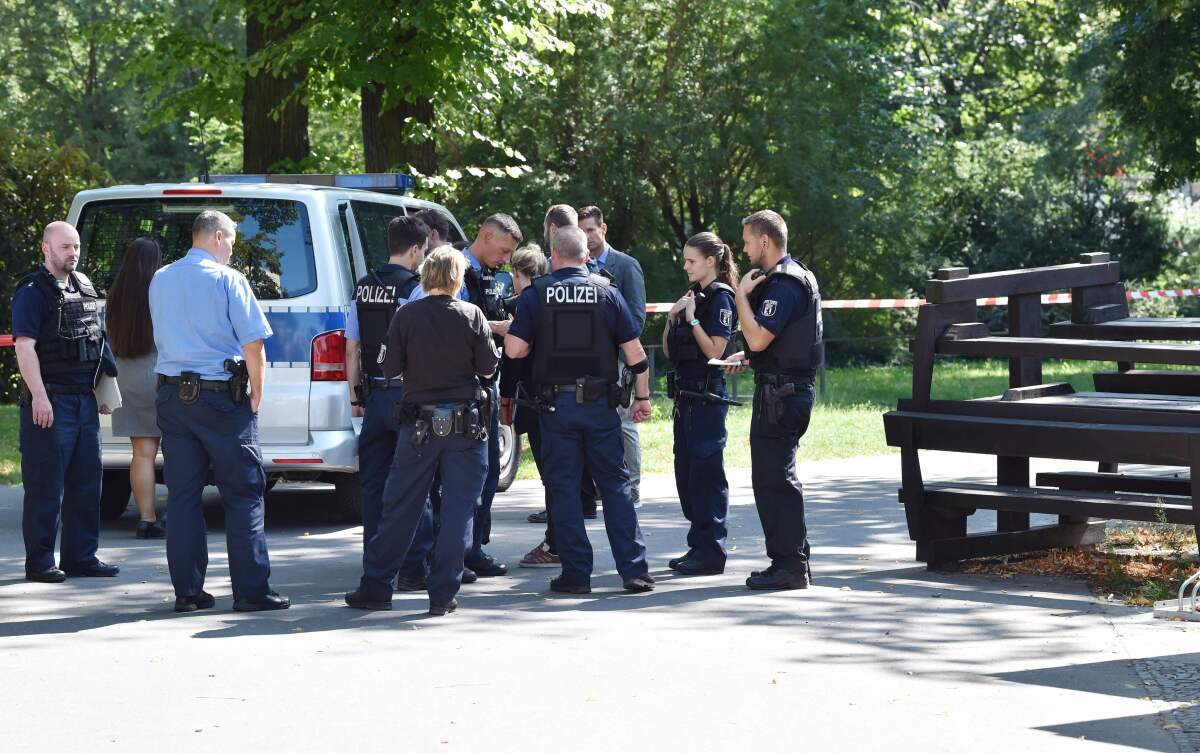 Police in Berlin at the scene of a Georgian man's fatal shooting Aug. 23, 2019. The victim was of Chechen ethnicity and had fought against Russian troops, receiving death threats after he fled to Germany in 2016.