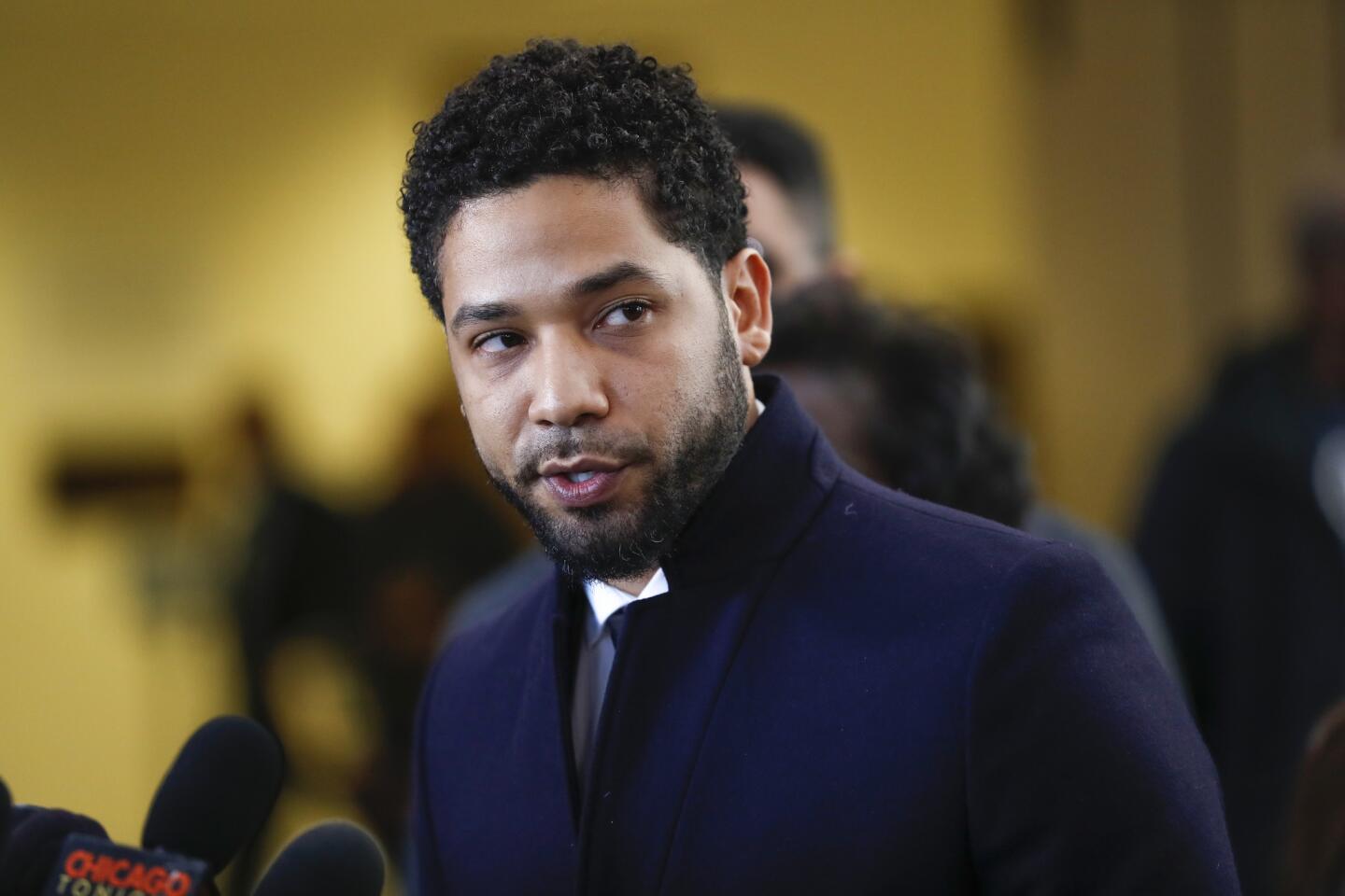 Jussie Smollett, the "Empire" star who has been charged for lying to police about an alleged fabricated attack, speaks to the media after all charges against him are dropped at the Leighton Criminal Court Building in Chicago on March 26, 2019.