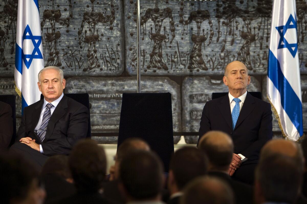 Israeli leaders Benjamin Netanyahu and Ehud Olmert in 2009