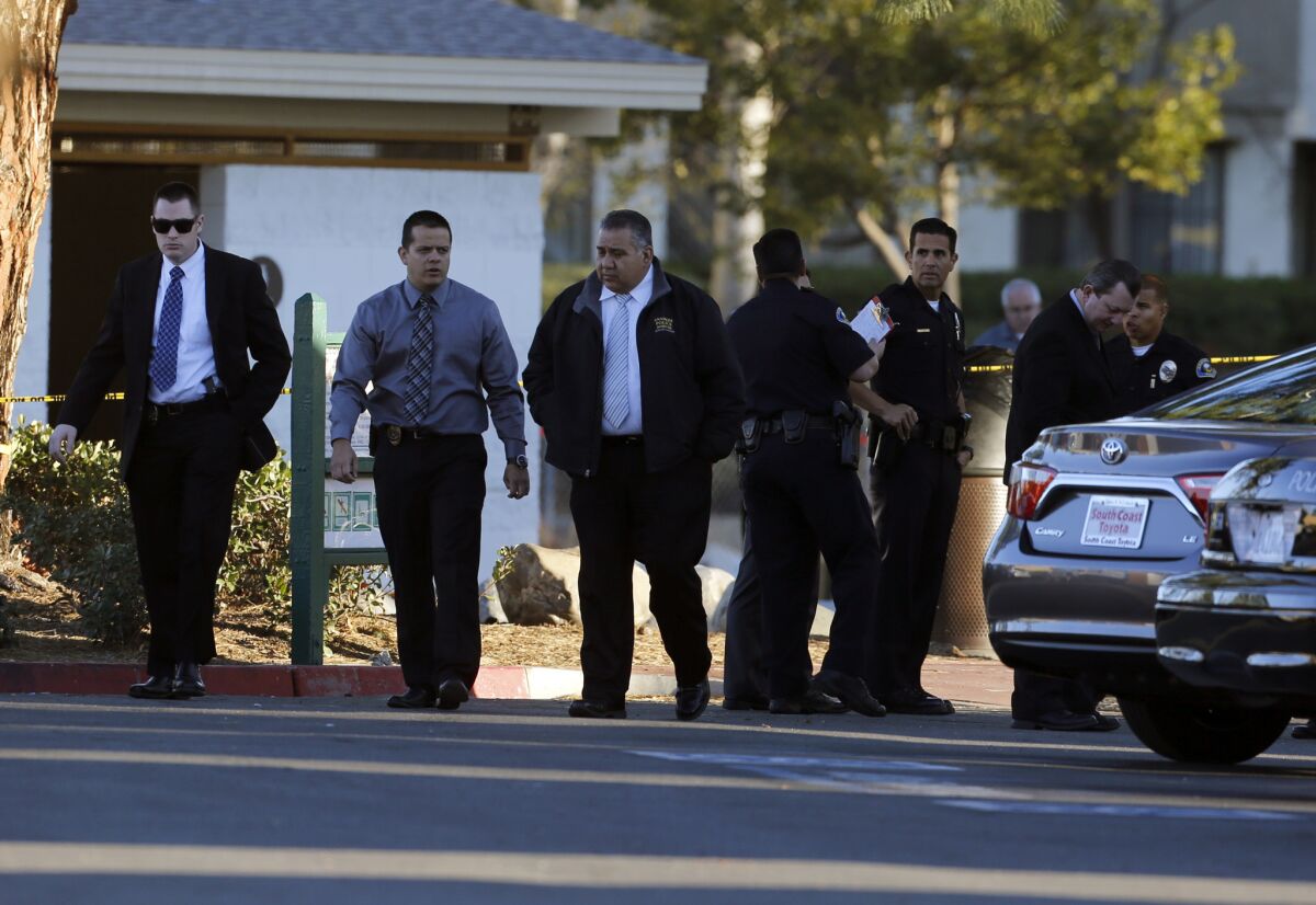 Investigators look for clues in Sage Park where an Anaheim Police Officer fatally wounded a 22-year-old man.