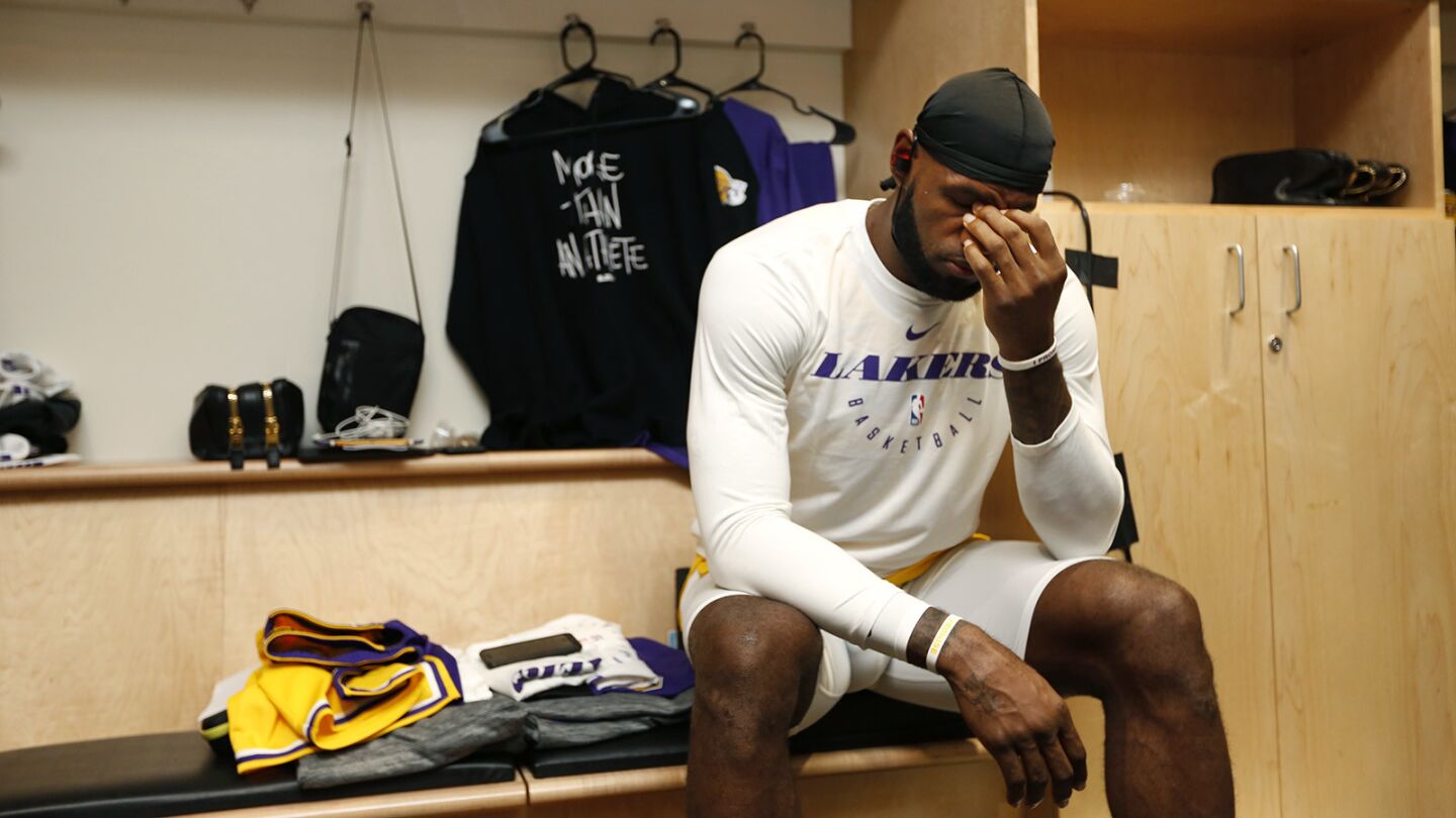 Los Angeles Lakers LeBron James sits in the locker room before a game against the Denver Nuggets in San Diego on Sunday, September 30, 2018. (Photo by K.C. Alfred/San Diego Union-Tribune)