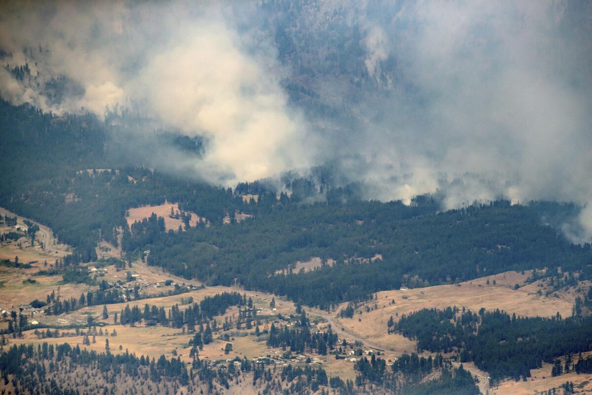 A wildfire burns in the mountains