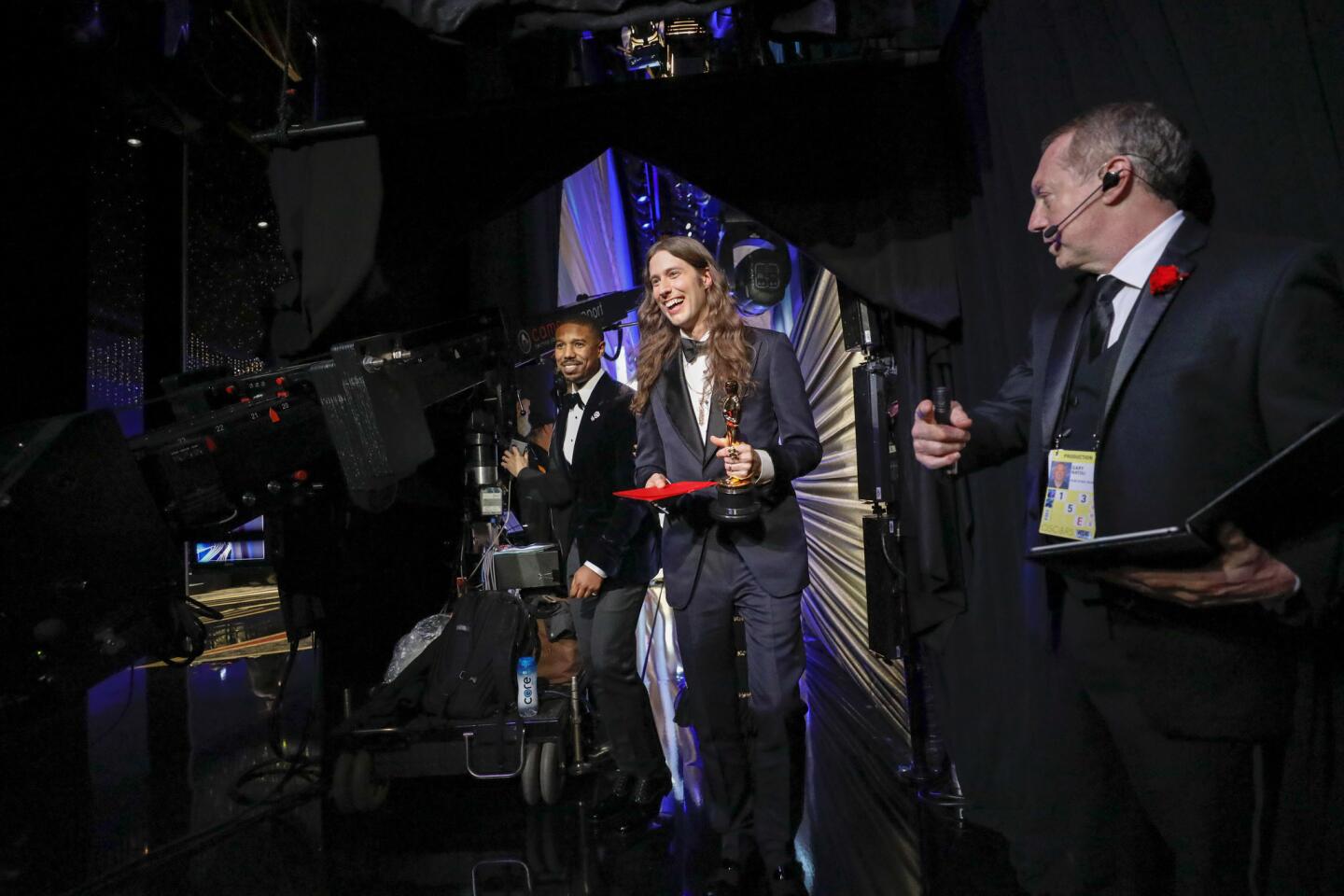 Composer Ludwig Göransson holds his award for original score for "Black Panther" backstage at the 91st Academy Awards on Sunday.