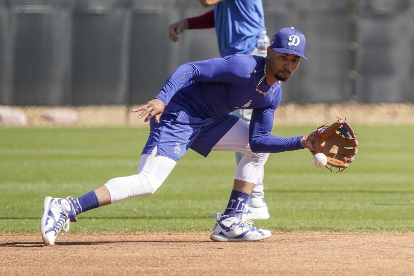 Los Angeles Dodgers shortstop Mookie Betts participates in spring training baseball workouts at Camelback Ranch in Phoenix, Monday, March 11, 2024. (AP Photo/Darryl Webb)